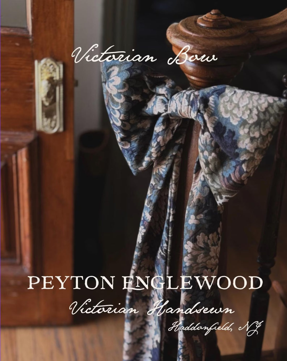 Handsewn Bow in tapestry fabric - hung on Victorian bannister near front door with brass hardware.