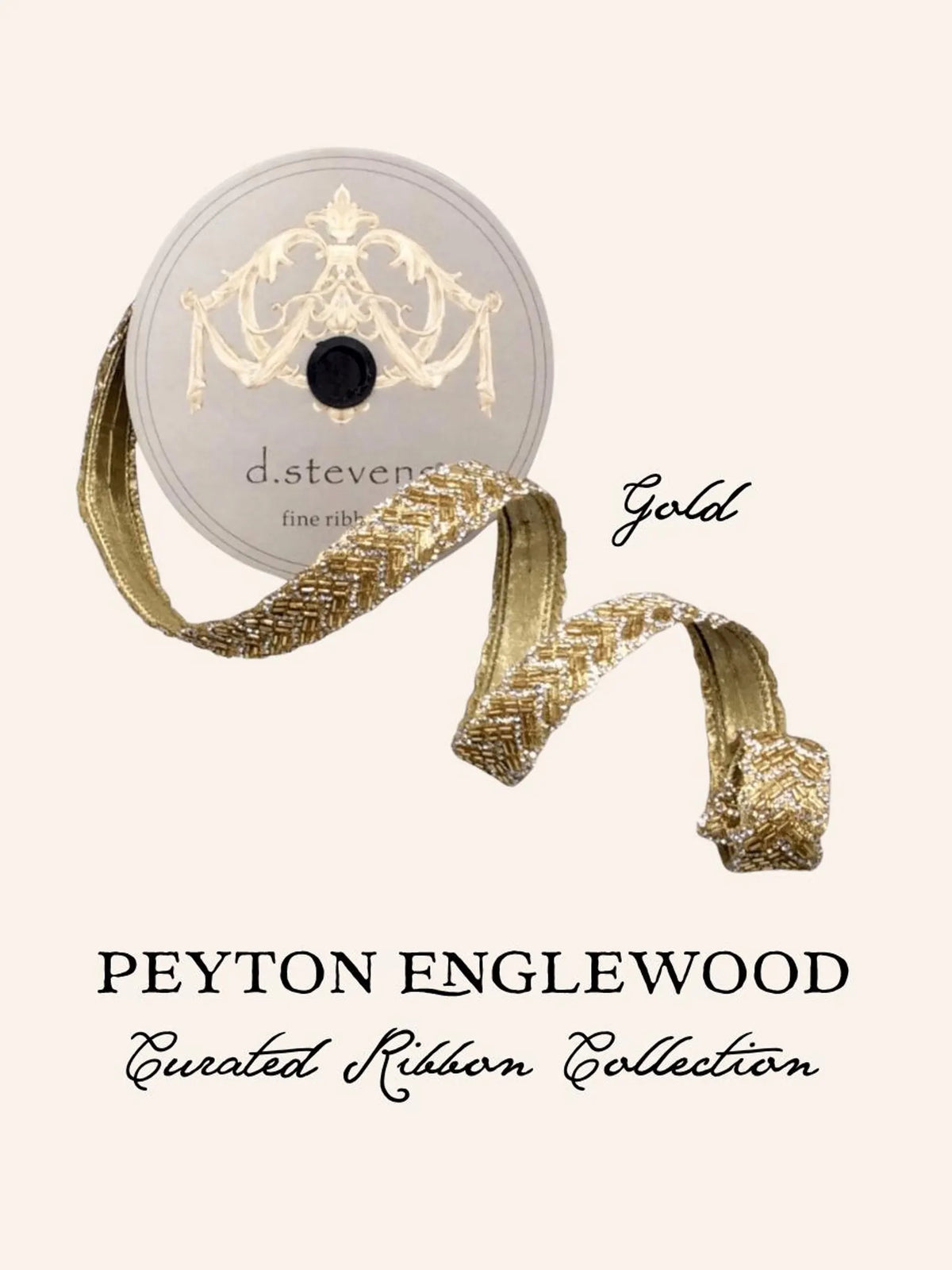 A spool of gold decorative ribbon with a matching ribbon unspooled across a light beige background. The spool label reads 'd stevens. graphic reads Peyton englewood curated ribbon library
